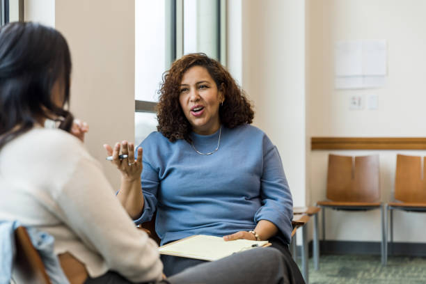 istock Female supervisor talks with her employee in the conference room 1470587703