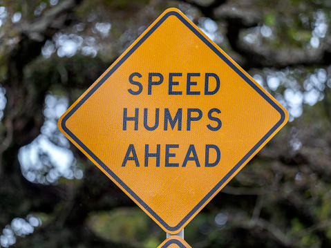 Speed hump sign close up view