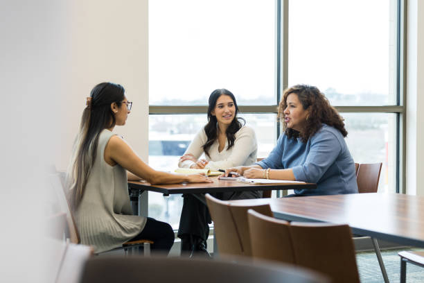 istock Mid adult female interviews for a new position within the company 1470588607