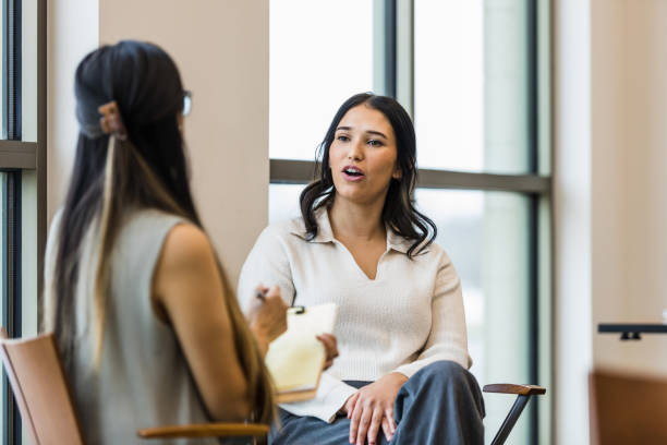 istock Frustrated female employee talks with the human resources manager 1470588634