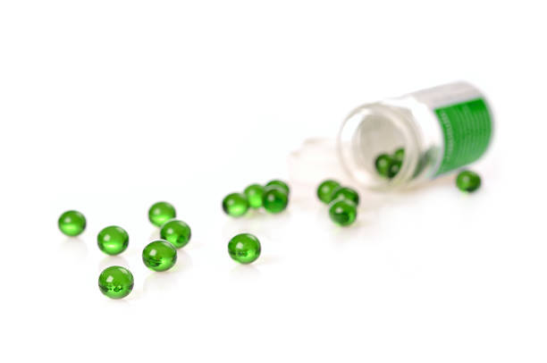 Green gel pills stock photo