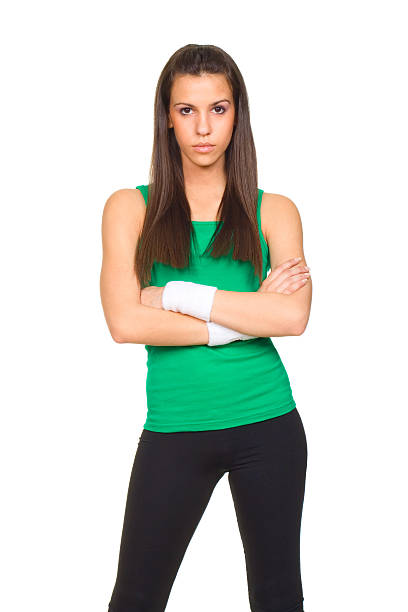 Young woman in fitness outfit posing stock photo