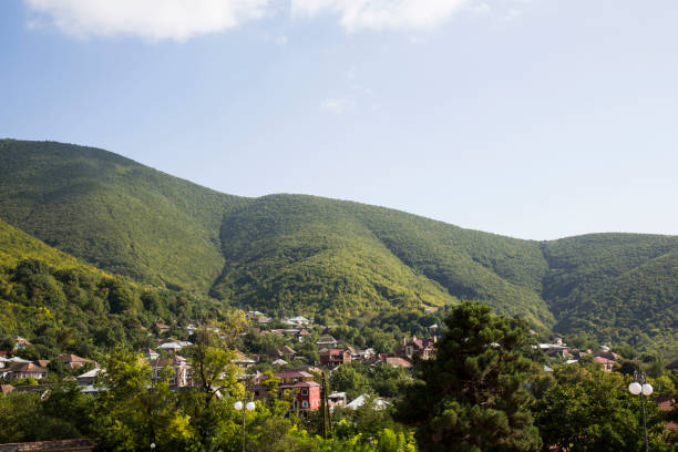The small mountain town of Sheki sits nestled in the lush green hills of Azerbaijan