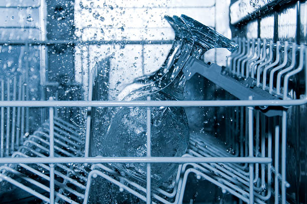 The inside of a dishwasher with glasses