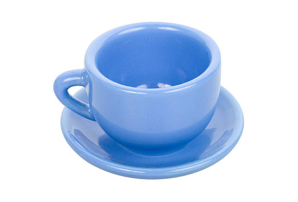 istock close-up blue cup with saucer, isolated on white 147060073