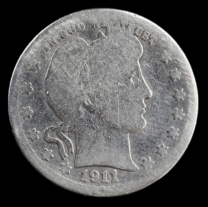 1911 heavily worn Barber Liberty Head silver quarter.