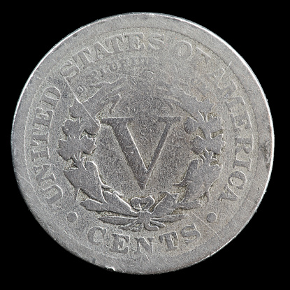 Reverse side of a badly worn 1910 Barber Liberty Head nickel minted in Philadelphia.