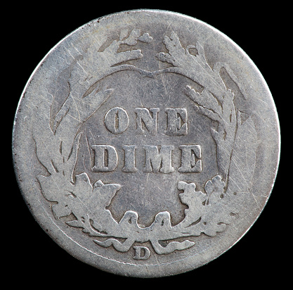 Reverse side of a badly worn 1910 Barber Liberty Head dime minted in Denver.