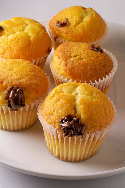 Muffins with hazelnut cream (vertical) stock photo