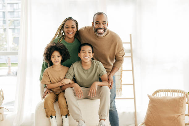 istock Two parents and two kids together during spring break 1470608210