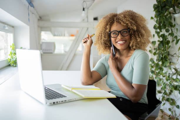 istock Young woman working from home 1470608413