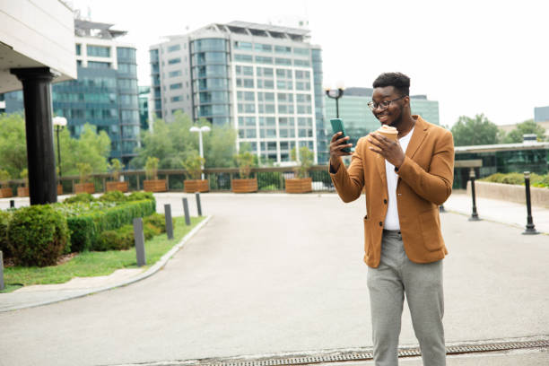 istock Young African businessman   on a coffee break making a video call 1470608592