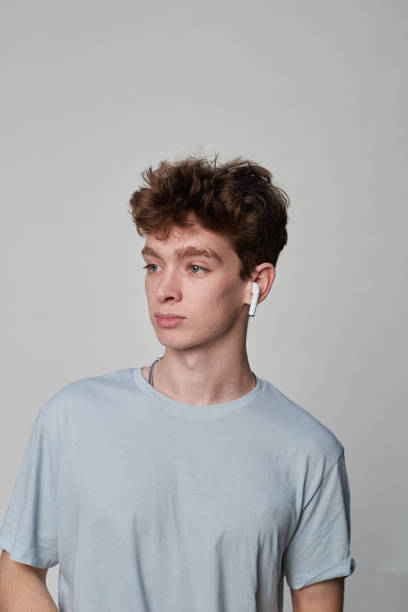 istock Side view of a boy with earphones 1470608653