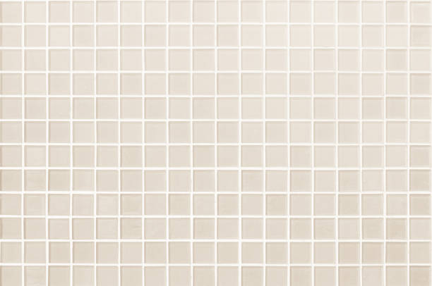 istock Cream pastel ceramic wall and floor tiles abstract background. Design geometric mosaic texture decoration of the bedroom. Simple seamless pattern for backdrop advertising banner poster or web. 1470608732