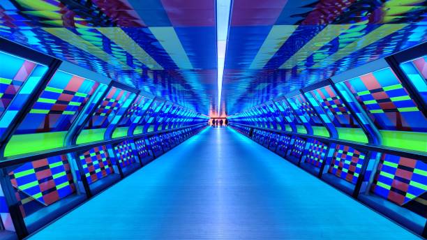 istock Illuminated pedestrian pathway Adams Place Bridge (Canary Wharf Crossrail Tunnel) also called 