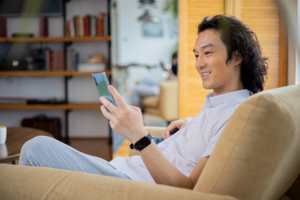 istock Young man is talking on the phone 1470615037