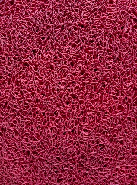 red abstract patterned floor mat for cleaning feet - rubber floor mat floor doormat imagens e fotografias de stock