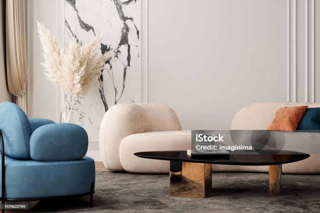 Elegant Mid-Century Modern Beige Living Room With Curved Sofa And Armchair Living room with mid-century style curved sofa. Indoors Stock Photo