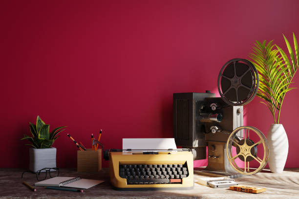 istock Retro vibe background with red wall behind with old typewriter and old movie projector, 3d rendering 1470624807