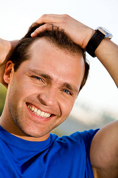 istock Smiling man outdoors 147062882