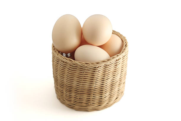 basket of eggs stock photo