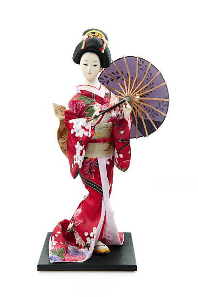 istock Japanese geisha doll isolated on white. 147063443