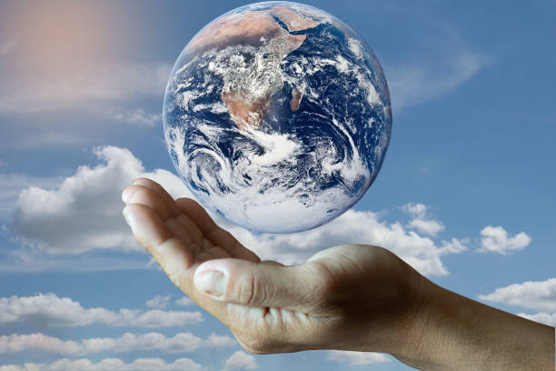 istock Earth image in hand, environment conservation concept on blue gold backgroundElements of this image furnished by NASA 1470634911