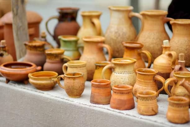 istock Ceramic dishes, tableware and jugs sold on Easter market in Vilnius. Lithuanian capital's traditional crafts fair is held every March on Old Town streets. 1470636168
