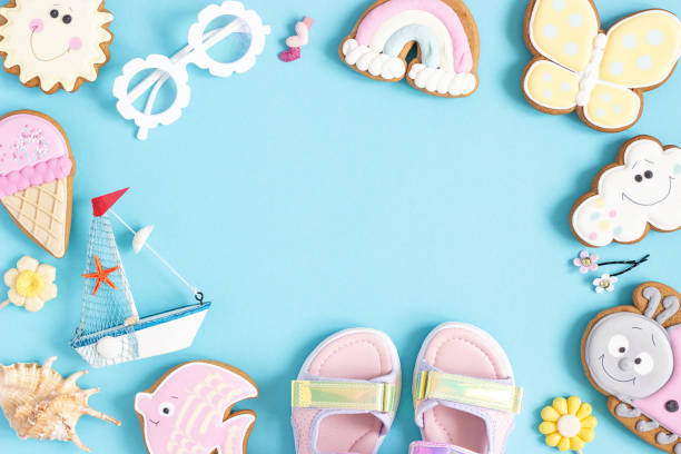 istock Bright creative layout made of cute summer symbols with copy space on blue background. Top view, Flat lay. Creative summer concept 1470636182