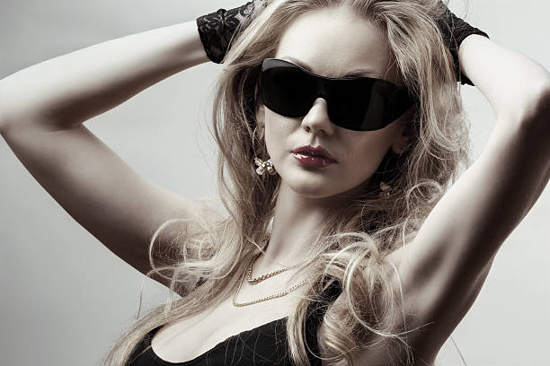 istock blonde wearing sunglasses 147063634