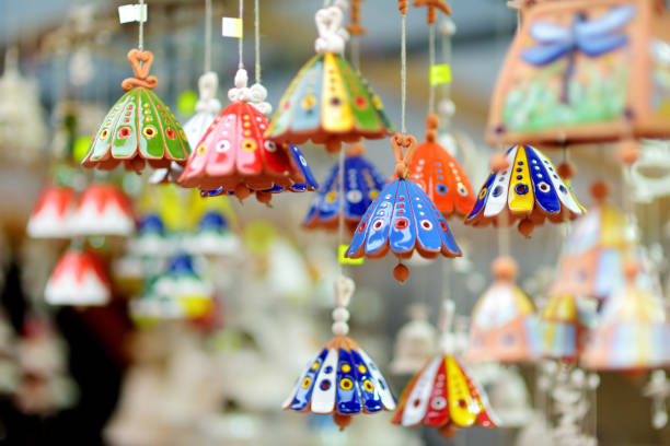 Colorful ceramic bells and other decorations sold on Easter market in Vilnius. Lithuanian capital's annual traditional crafts fair is held every March on Old Town streets.