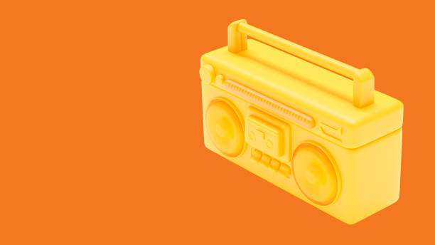 reproductor de casetes antiguo amarillo vista izquierda. diseñado en concepto minimalista.  fondo naranja y trazado de recorte. - radio old fashioned antique yellow fotografías e imágenes de stock