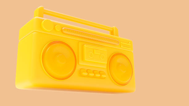 reproductor de casetes antiguo amarillo. diseñado en concepto minimalista.  fondo naranja y trazado de recorte. - radio old fashioned antique yellow fotografías e imágenes de stock