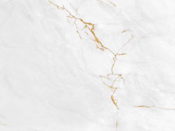 istock White and gold marble luxury wall texture with shine golden line pattern abstract background design for a cover book or wallpaper and banner website 1470642536