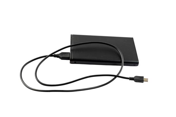 Black metallic power bank on white isolated background