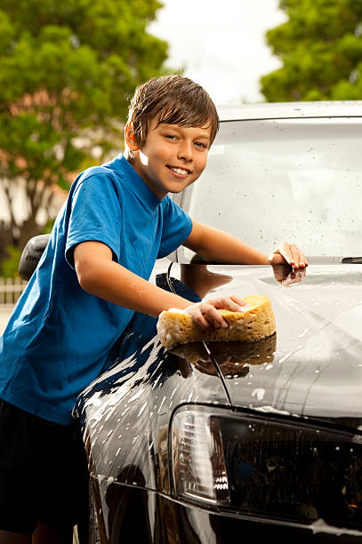 istock Earning some money washing the car 147064883