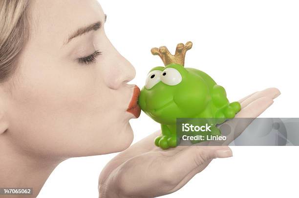 Frog Prince Being Kissed By A Beautiful Glamour Model Stock Photo - Download Image Now