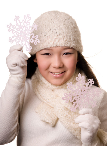 beautiful asian girl with snowflakes