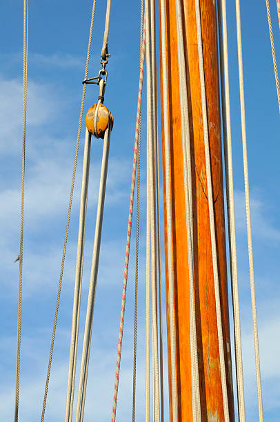 istock Ship mast and pulley with ropes 147065711