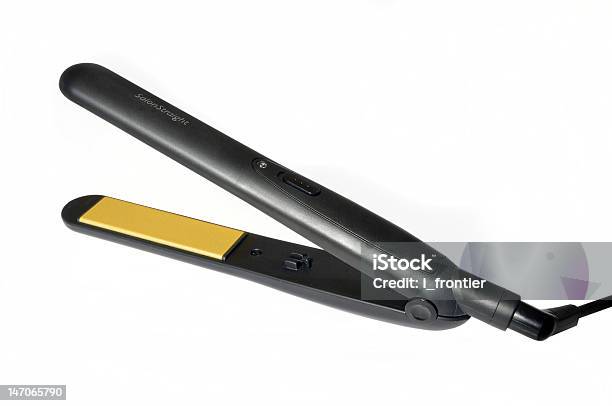 Straightener De Cabello Foto de stock y más banco de imágenes de Planchas de pelo - Planchas de pelo, Amarillo - Color, Calor