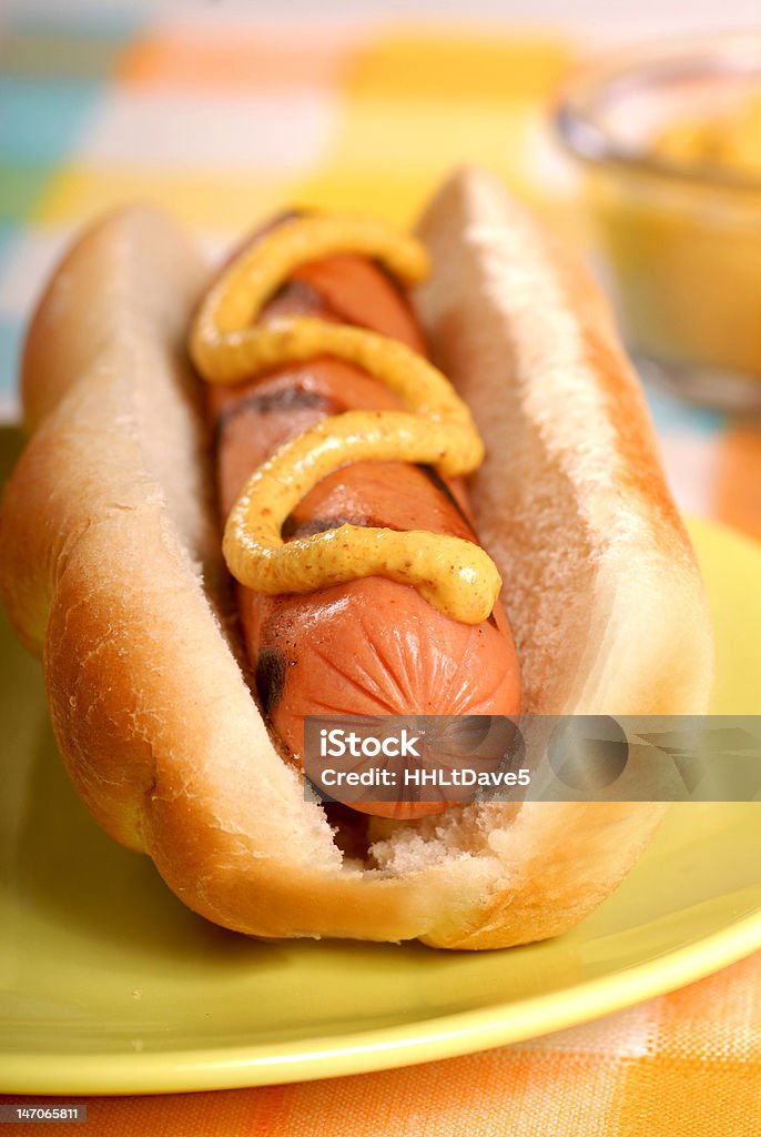 Hot Dog Freshly grilled hot dog with spicy mustard Barbecue - Meal Stock Photo