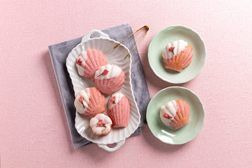 Cherry Blossom Madeleines with salt pickled cherry blossoms and melted white chocolate
