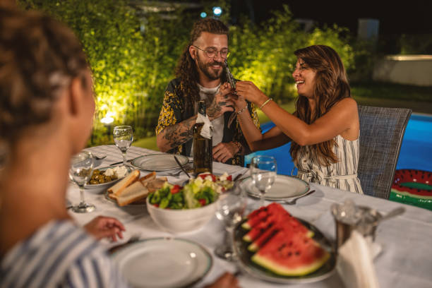 istock Happy couple having fun on a dinner party 1470660756