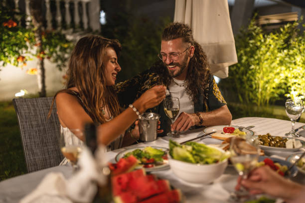 istock Lovely couple at the summer dinner 1470663784