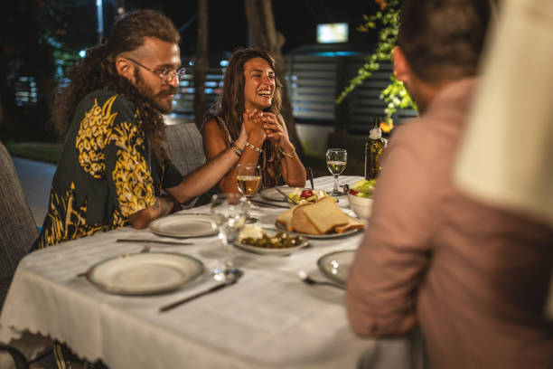 istock Happy couple having fun on a dinner party 1470664467