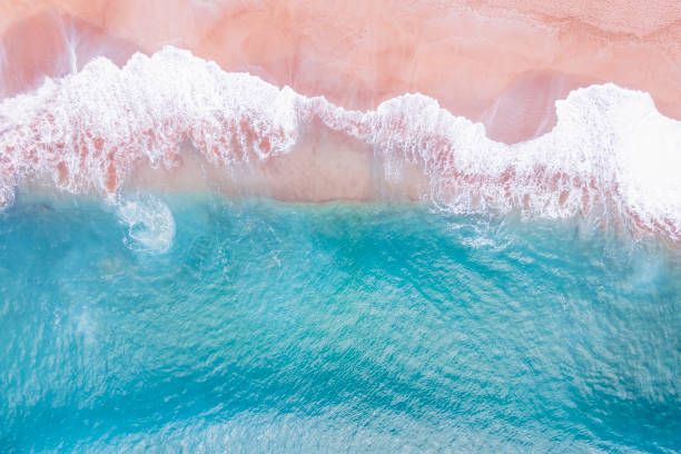 istock A ocean waves and beach top view, natural background. 1470666777