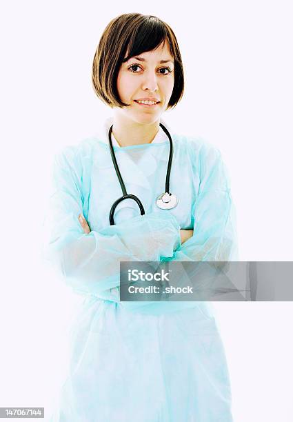Feliz Enfermera Con Estetoscopio Aislado En Blanco Foto de stock y más banco de imágenes de Adulto - Adulto, Adulto joven, Asistencia sanitaria y medicina