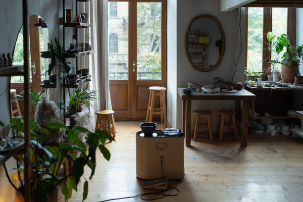 istock Interior of ceramist workshop or hall for teaching lessons on making pottery with potter wheel 1470674522