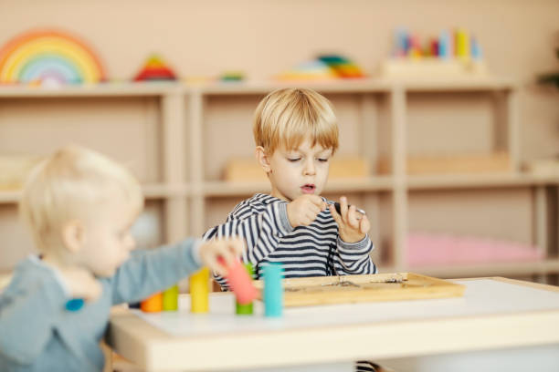 istock Selective focus on a boy learning motor and logic skills in kindergarten. 1470681535