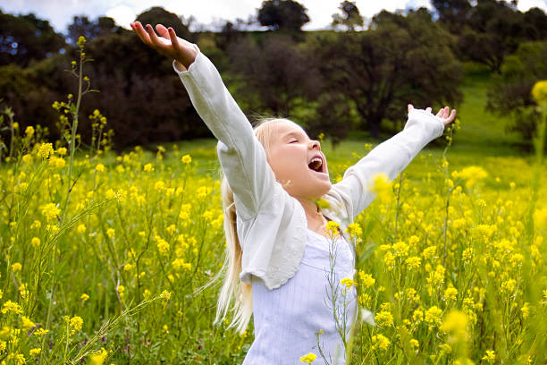 istock Young Girl Flower Field 147068648